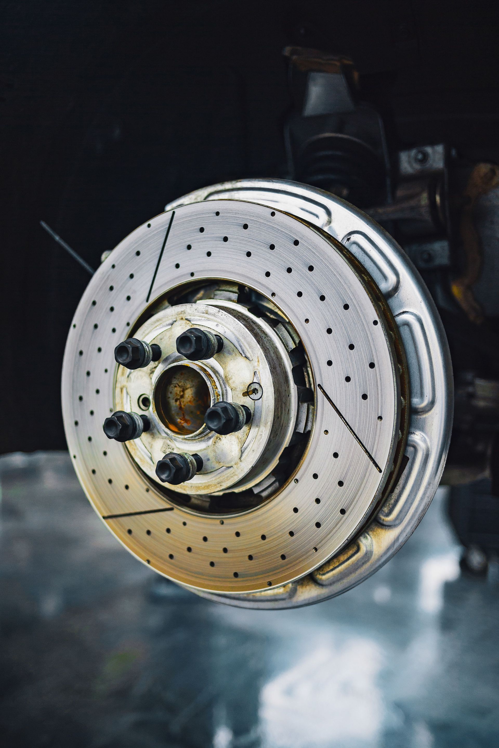 Steel automobile disk brake without wheel for car service and repair concept